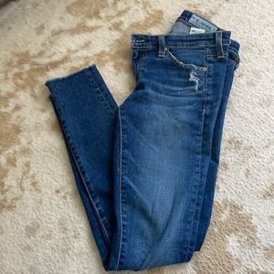 Size 24 AG skinny jeans lightly distressed